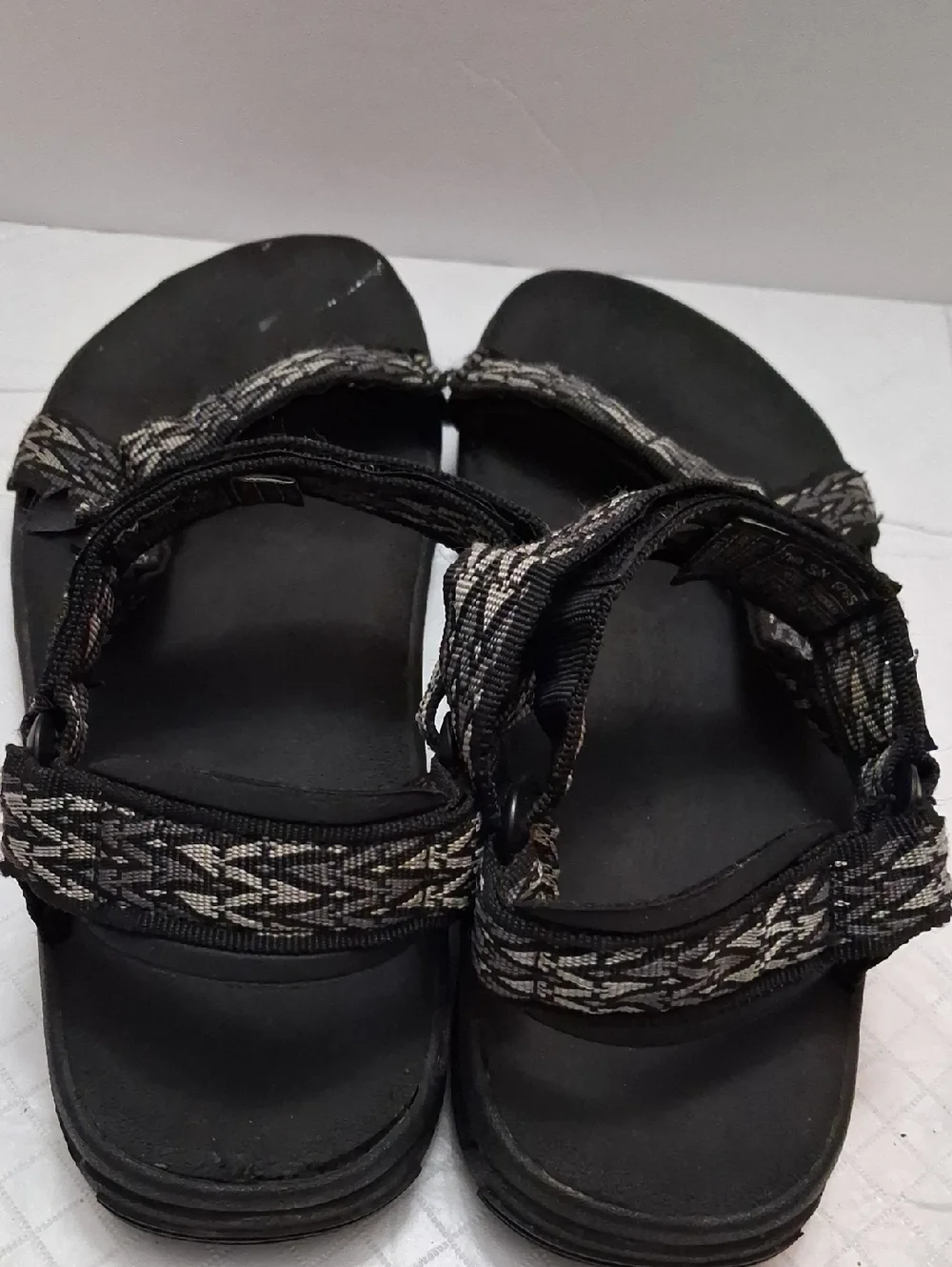 Teva Size 10 men's sandal in black, gray strap with velcro adjustable strap.